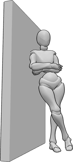 Referência de poses- Pose de encostado à parede - A mulher está de pé e encostada à parede, de braços cruzados
