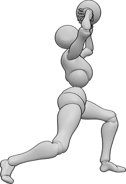 Référence des poses- Pose féminine de volley-ball - Une joueuse de volley-ball fait voltiger le ballon avec les deux paumes au-dessus de sa tête.