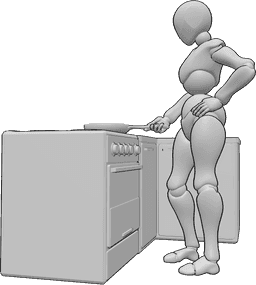 Referencia de poses- Postura femenina para cocinar - Mujer de pie en la cocina, cocinando, con una sartén en la mano derecha.