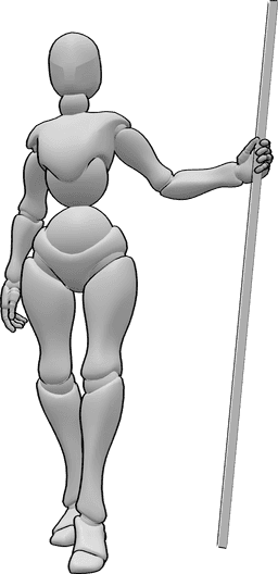 Référence des poses- Femme prenant la pose du personnel - Femme tenant un bâton dans sa main gauche pose