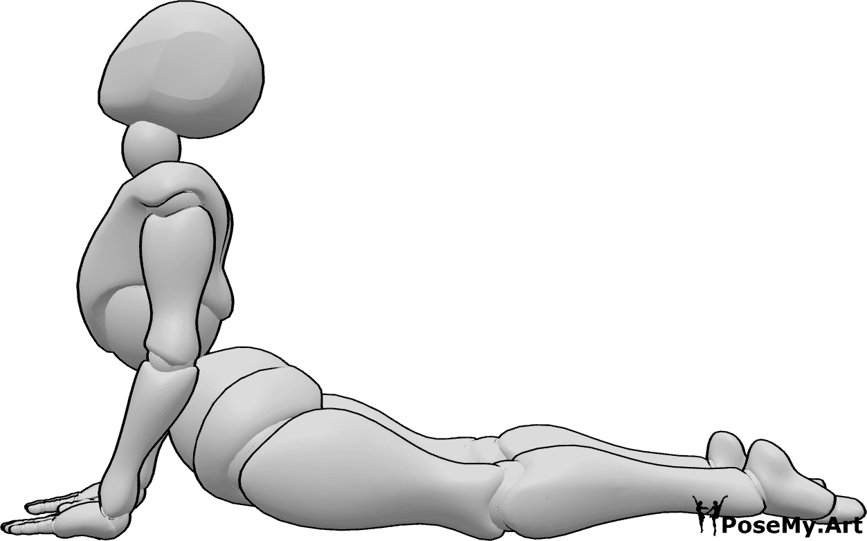 Referência de poses- Pose de alongamento da cobra - A mulher está a fazer a pose de alongamento da cobra, com as mãos no chão e a olhar para cima
