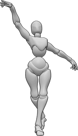 Référence des poses- Pose élégante des mains pour la danse - Une femme danse et lève élégamment les mains en regardant vers l'avant, pose élégante des mains.