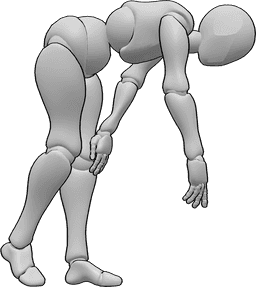Posen-Referenz- Nach-unten-greifen-Pose - Frau versucht, etwas auf dem Boden zu erreichen, bückt sich und streckt ihre rechte Hand aus