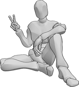 Referencia de poses- Masculino sentado pose de paz - Varón sentado, mirando al frente y mostrando el signo de la paz con la mano derecha