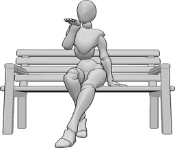 Référence des poses- Baiser soufflant pose mignonne - Une femme est assise sur un banc et envoie un baiser à quelqu'un.