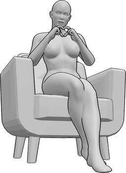 Posen-Referenz- Weibliche Finger-Herz-Pose - Die Frau sitzt im Sessel und formt ein Herz mit ihren Fingern