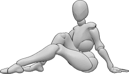 Référence des poses- Femme assise - La femme est assise sur le sol et prend la pose en s'appuyant sur sa main gauche.