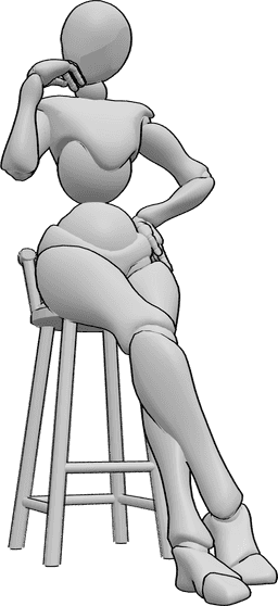 Referência de poses- Pose sentada gira - A mulher está sentada, com uma pose bonita, as pernas cruzadas e a mão esquerda na anca