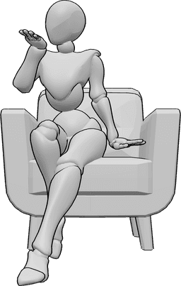 Posen-Referenz- Niedliche Pose beim Küssen - Frau sitzt im Sessel und bläst einen Kuss, niedliche Sitzhaltung