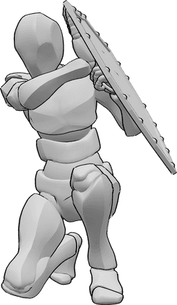 Referencia de poses- Postura con escudo - El hombre está arrodillado y sujeta el escudo con ambas manos