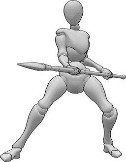 Référence des poses- Femme tenant une lance - La femme est debout et tient une lance à deux mains, prête à attaquer.