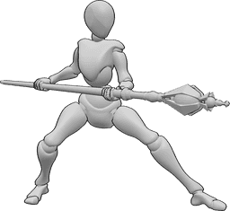 Référence des poses- Pose d'attaque du bâton magique - La femme tient un bâton magique à deux mains et est prête à attaquer.
