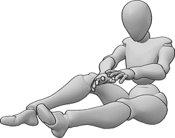 Posen-Referenz- Selbstheilungs-Pose - Weibliche Heilerin heilt sich selbst, sie legt ihre beiden Hände zu ihren Füßen und spricht einen Zauberspruch