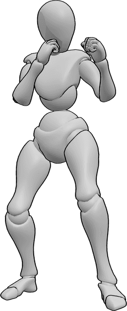 Referencia de poses- Postura femenina de boxeo - Mujer en posición de boxeo, con las manos cerradas en puños, lista para luchar.
