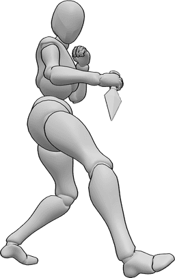 Posen-Referenz- Weibliche Kunai-Angriffspose - Die Frau dreht sich um und greift mit einem Kunai in der rechten Hand an, weibliche Kampfhaltung