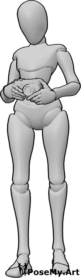 Pose Reference- Female holding camera pose - Female is standing, holding a camera in her hands, looking down