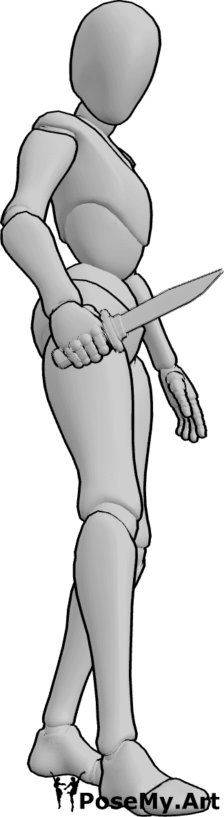 Pose Reference- Female dagger blade pose - Female is standing and holding a dagger in her right hand