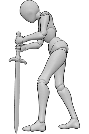 Referência de poses- Pose de esfaqueamento no solo com espada - A mulher está a espetar a espada no chão com as duas mãos