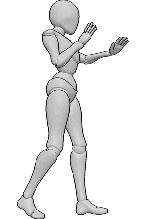 Referência de poses- Mãos femininas a defender a pose - A mulher está de pé e defende-se com as mãos