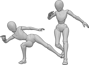 Referência de poses- Pose de ataque com pontapé baixo - As fêmeas estão a lutar, uma delas está a dar pontapés, a outra está a esquivar-se do ataque