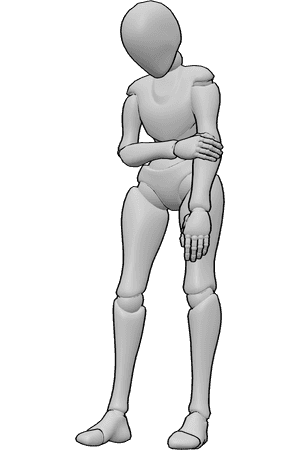Référence des poses- Femme en position debout, courbée - La femme se tient courbée, se tient le bras et regarde vers le bas.